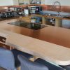 copper kitchen counter top and copper splashback
