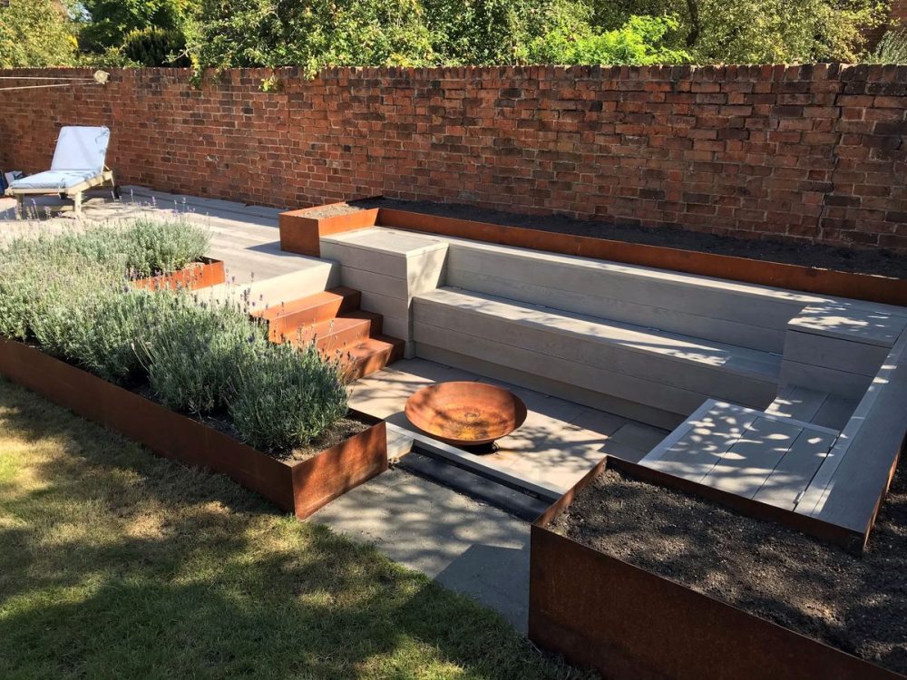 corten steel seating area in garden-min corten steel seating area in garden